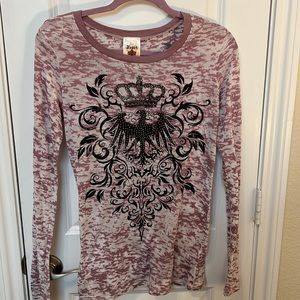 Burnout long sleeve tee with rhinestone detail on front. Super fun shirt.